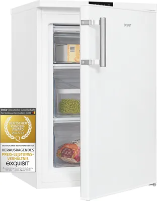 A white upright freezer with the door ajar, showing several drawers filled with food items, and prominent award badges on the left side.