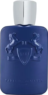 A studio shot of a blue perfume bottle with a silver cap.