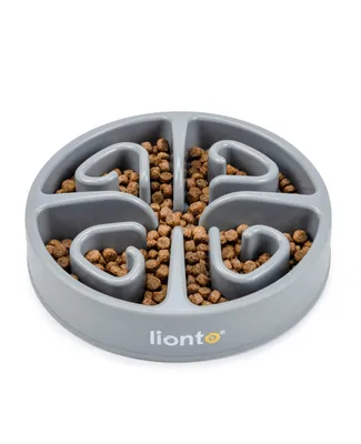 A gray dog or cat food bowl with a maze-like interior, filled with kibble, shown from a slightly elevated angle against a white background.
