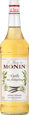 A bottle of Monin Vanilla Madagascar syrup.