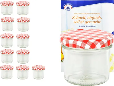 A set of small glass jars with red and white checkered lids, alongside a recipe booklet.