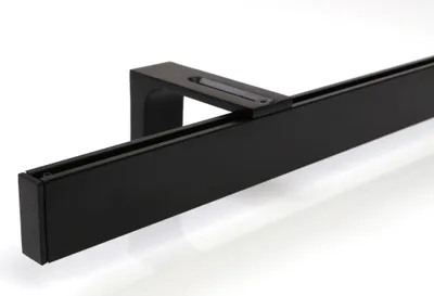 A close-up, angled shot of a black curtain rail system mounted on a white background.