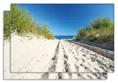 Produktbild von Wallario Frühstücksbrettchen 2er Set aus Glas, je 20 x 30 cm, mit rutschfesten Füßen, Motiv Auf dem Sandweg zum Strand - Blauer Himmel über dem Meer