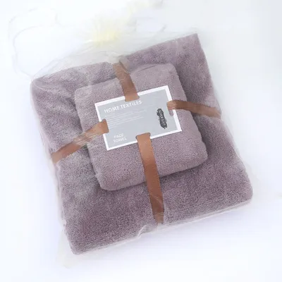 Imagen del producto de Toalla de terciopelo coral, suave y absorbente. Juego de toalla de baño y toalla de mano, color lila