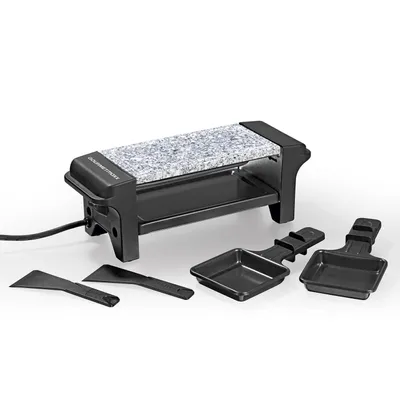 A raclette grill with accessories on a white background.