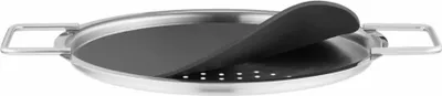 A stainless steel pan with a black perforated insert, shown from a slightly elevated angle.