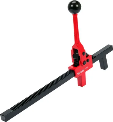 A red and black tire spreader tool is shown against a white background.