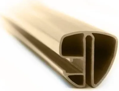 A close-up, angled view of a sand-colored pool handrail profile against a white background.