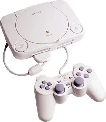 A white Sony PlayStation One console with a controller.