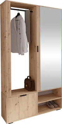 A wardrobe set with a mirror and clothes hanging on a rack.
