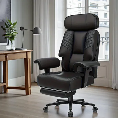 A black leather office chair is shown next to a wooden desk with a lamp and books.