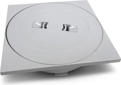 A square skimmer lid with a circular inset and two levers.