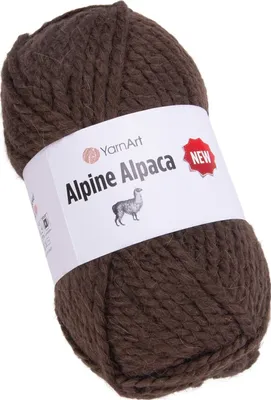 A ball of brown yarn with a label.