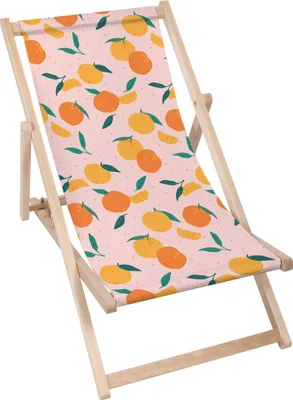 A foldable wooden deck chair with a pink fabric featuring an orange and green mandarin pattern, set against a white background.