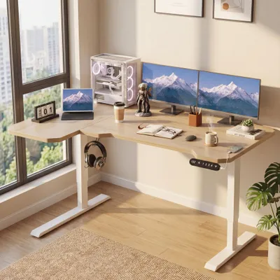 A modern home office setup with a standing desk, multiple monitors, and a laptop.