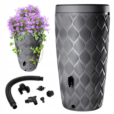 A rain barrel with a planter on top and accessories laid out below, all on a white background.
