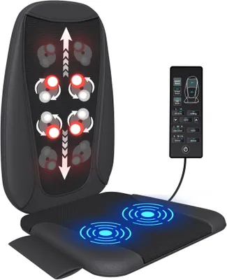 A black shiatsu massage seat with a remote control.