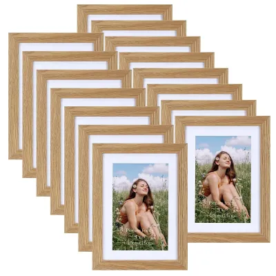 Image de 15 cadres photo de 10 x 15 cm - Cadres en bois naturel