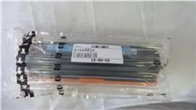 A sealed plastic package containing multiple toner cartridges.