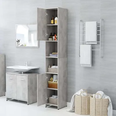 A bathroom with a tall cabinet, sink, and laundry baskets.