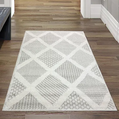 Produktbild von Wohnzimmer Schlafzimmer Teppich mit verschieden gemusterten Rauten in creme grau Größe - 80 x 150 cm