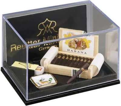 Zdjęcie produktu dla Miniaturowa porcelanowa cygaro z elementami złota, wykonane ręcznie