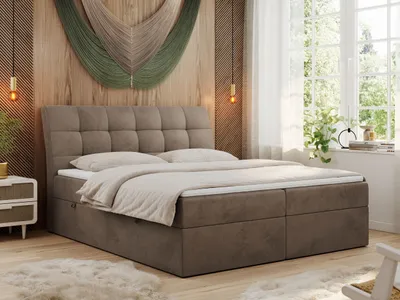A bedroom scene with a bed, nightstand, and window.