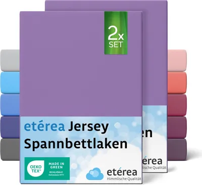 A stack of folded violet jersey fitted sheets with a green '2x SET' badge.