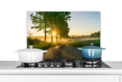 Obrázok produktu pre MuchoWow® Splashback Kuchyňa - Kuchynský backsplash - Ochrana steny pre sporák a drez Východ slnka cez stromy 70x50cm Alu-Dibond (alternatíva k