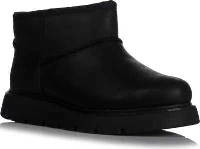 A black boot is shown from the side against a white background.