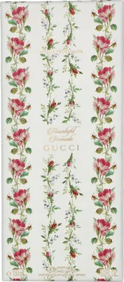 A box for Gucci Moonlight Serenade Eau de Parfum, decorated with floral patterns.