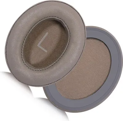 Two ear pads for headphones are shown, one on top of the other.