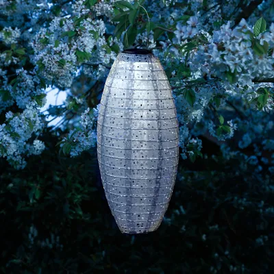 Produktbild von LED Solar Lampion oval - mit Blumenmuster - warmweiße LED - H: 40cm - D: 20cm - Lichtsensor - blau