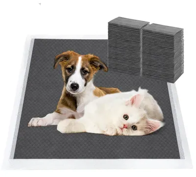 Produktbild von Trainingspads für Hunde und Welpen, 50 Stück, mit Kohlenstoff zur Geruchskontrolle, auslaufsicher, schnell trocknend, 45x33cm