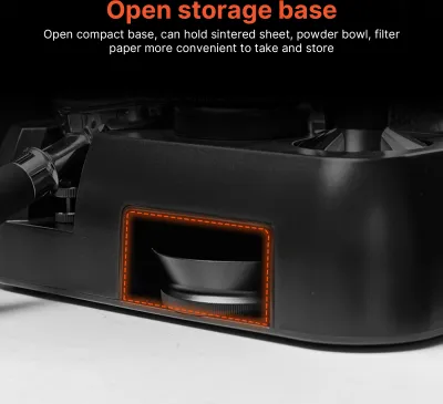 Close-up of the base of a coffee tamper station, highlighting an open storage compartment.