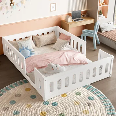 A child's bedroom with a white bed, desk, and chair.