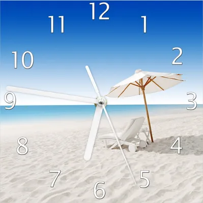 Produktbild von Wallario Design Wanduhr Sonnenliege am weißen Strand unter blauem Himmel aus Echtglas, Größe 20 x 20 cm
