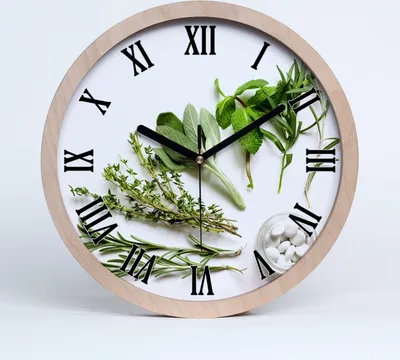 Produktbild von Holzuhr 25fi cm wanduhr - schwarze Spitzen - Kräuter
