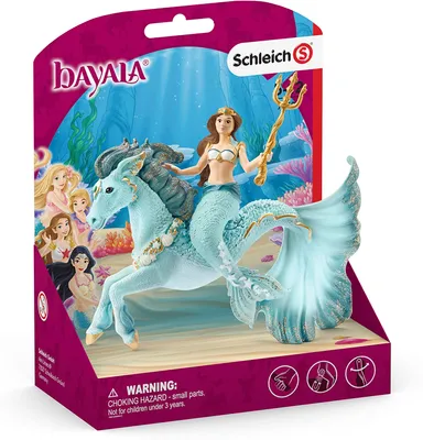 A toy mermaid riding a mythical sea horse, presented in its retail packaging.