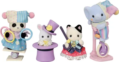 Four circus-themed animal figurines arranged on a white background.