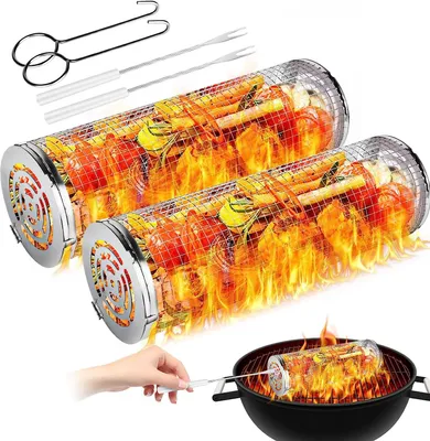 Two stainless steel grilling baskets filled with vegetables are shown being used on a charcoal grill.