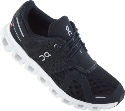 A single black and white running shoe is shown against a white background.
