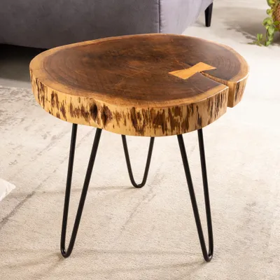 A close-up view of a wooden side table with metal legs.