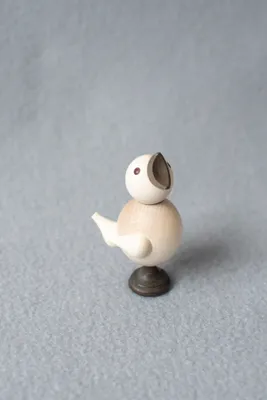 Produktbild von Holzspielzeug Küken mit Stimme natur Höhe=8cm NEU