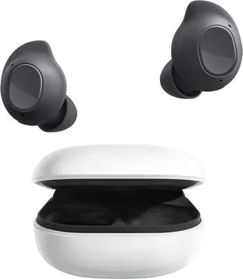 A pair of dark grey wireless earbuds and their white charging case are displayed against a white background.