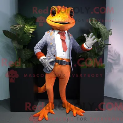 Immagine prodotto di Personaggio mascotte REDBROKOLY di un geco arancione vestito con giacca e cinture