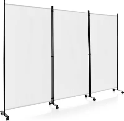 A white fabric room divider with black metal frames and wheels, set up in a studio or showroom.
