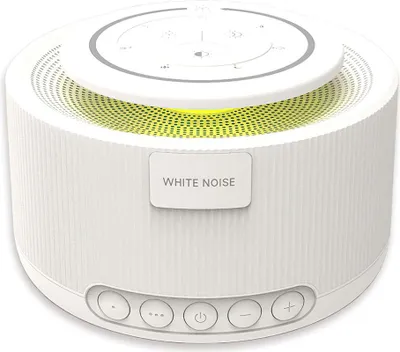 A white sound machine with a yellow light inside, shown from a diagonal angle.