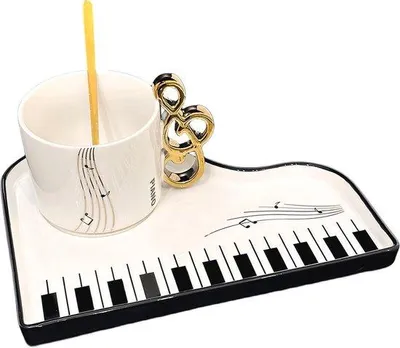 Produktbild von Keramische Kaffeetasse mit Notizgriff und Klavierdesign für Musikfans