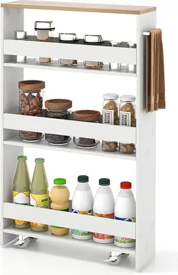 A white and natural wood slim rolling cart filled with various jars and bottles.